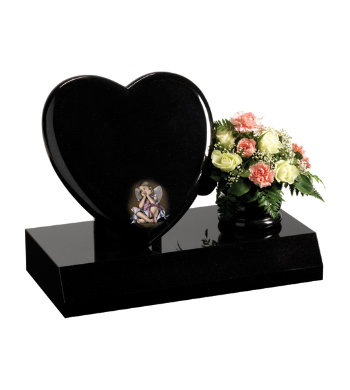 Black granite children’s headstone with heart shaped memorial and rose bowl vase.