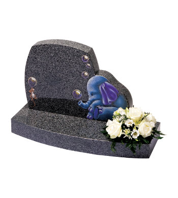 Impala grey granite children’s headstone with gentle curves and children’s toy designs.