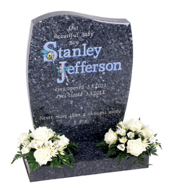 Blue pearl granite children’s headstone with fairy-tale images combined with unique lettering.