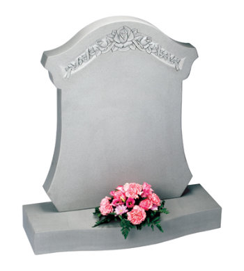 Serena stone headstone with deep floral carving on a unique shape.