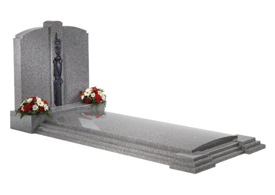 Cathay light grey granite kerb memorial with full cover slab, stepped kerbs and decorative ornamentation.