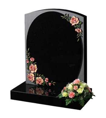 Black granite headstone of camber top shape with decorative carved roses.