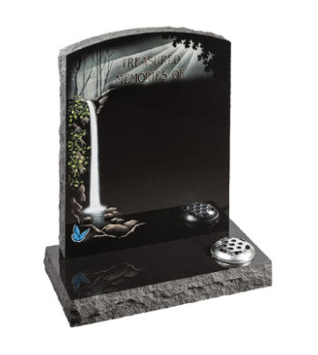 Black granite headstone of camber top shape with pitched edges and waterfall design.