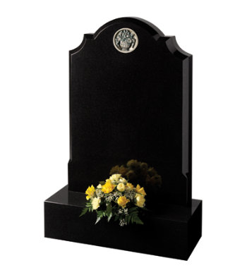 Black granite headstone with centre round checked shoulders and 6inch base.
