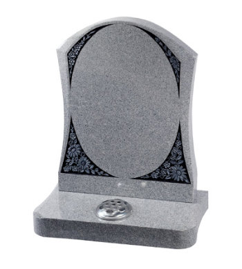 Sera grey granite headstone with carved floral panels.