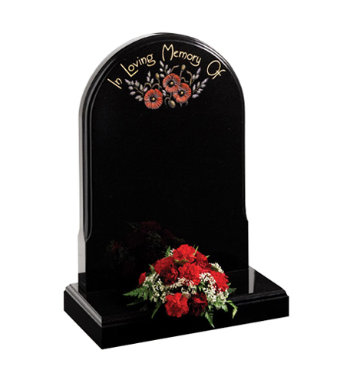 Black granite headstone of norman round shape and mouldings front and back.