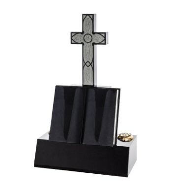 Black granite headstone with sculpted Latin cross and open book.