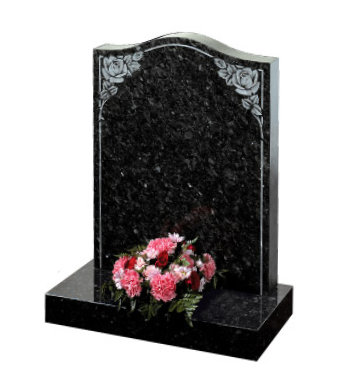 Emerald pearl granite headstone of ogee shape with shaded roses.