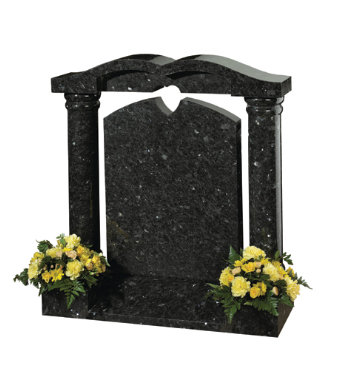 Emerald pearl granite headstone of pillared shape with heart detail.