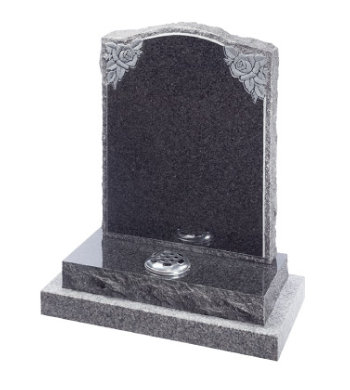 South African dark grey granite headstone with pitched back and sidesand carved roses.