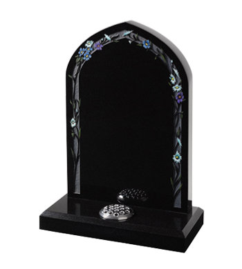 Black granite headstone with gothic top and floral design around the other edge.