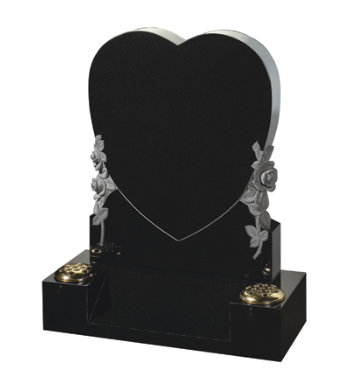 Black granite headstone with heart shaped headpiece and carved roses.